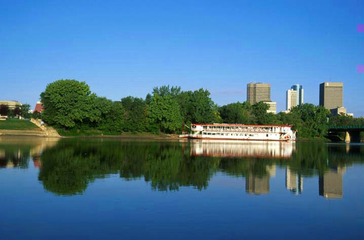 Winnipeg skyline with paddle wheel on river