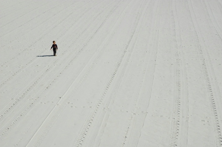 Boy on a White Sand Beach