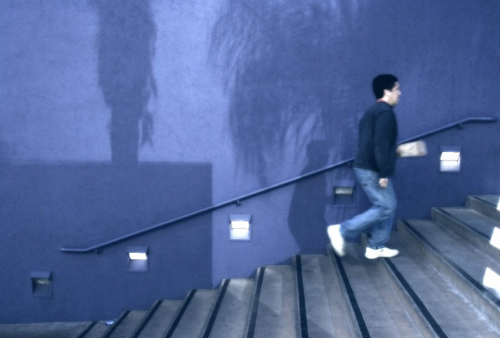 Man Walking Up Stairs