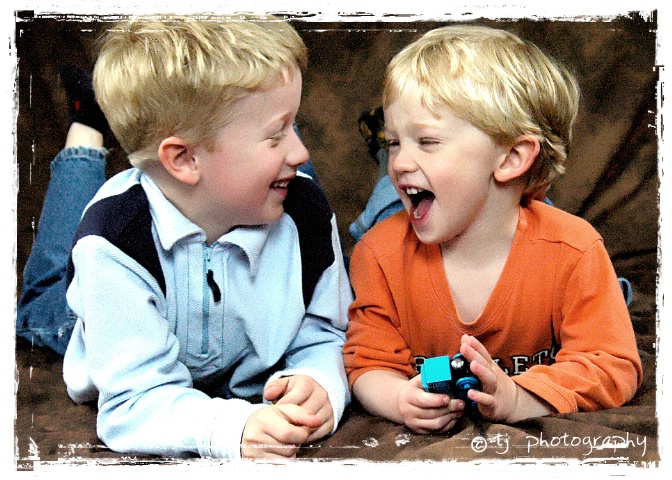 giggles between brothers