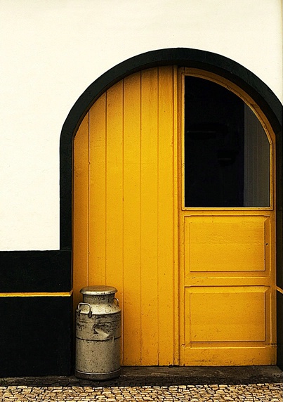 The milk can and yellow door