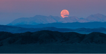 Full Moon Over the Peaks