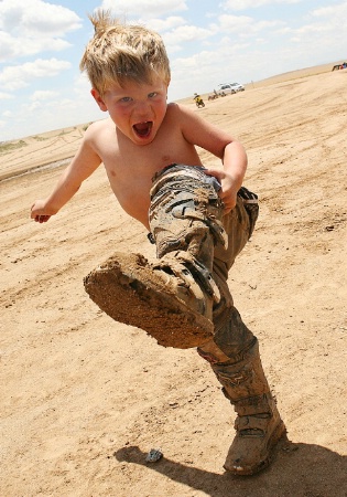 A Boy Is "COOL" When He's GOT MUD 