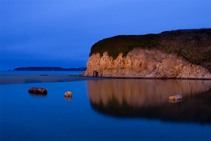 Driftwood and cliffs