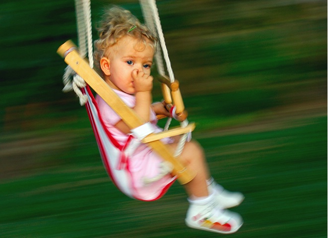 My daughter in a swing
