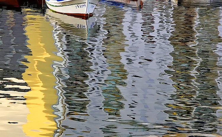 Reflections in dock of bay