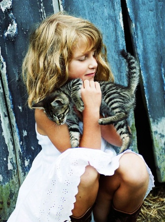 Country girl with kitten
