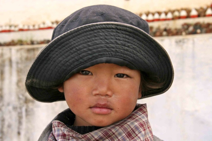 Boy at mountain pass, Bhutan