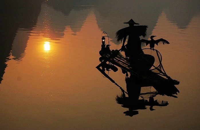 Fisherman under Sunrise