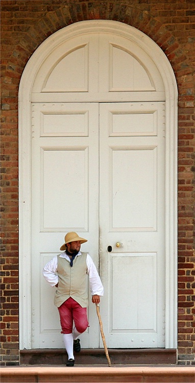 Colonial door man.