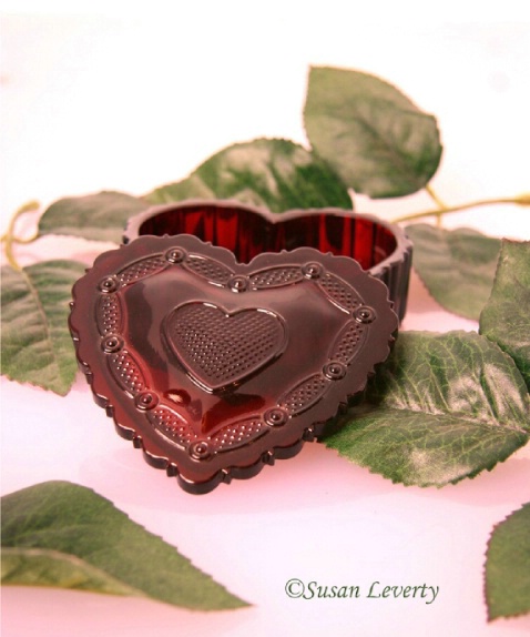 Avon Heart with green leaves