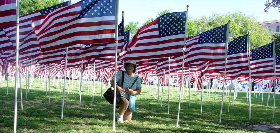 Kneeling by the Flags