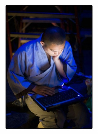 Buddhist Monk at Computer