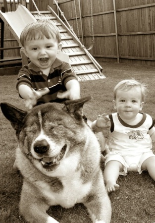 Evan riding Shadow with Jack beside him