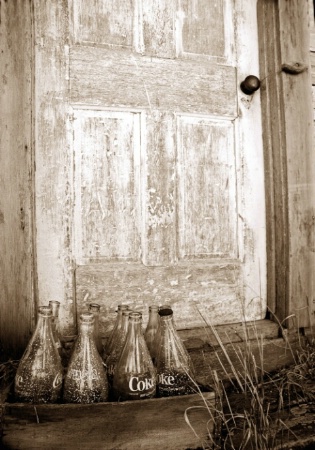 Old Door & Coke Bottles
