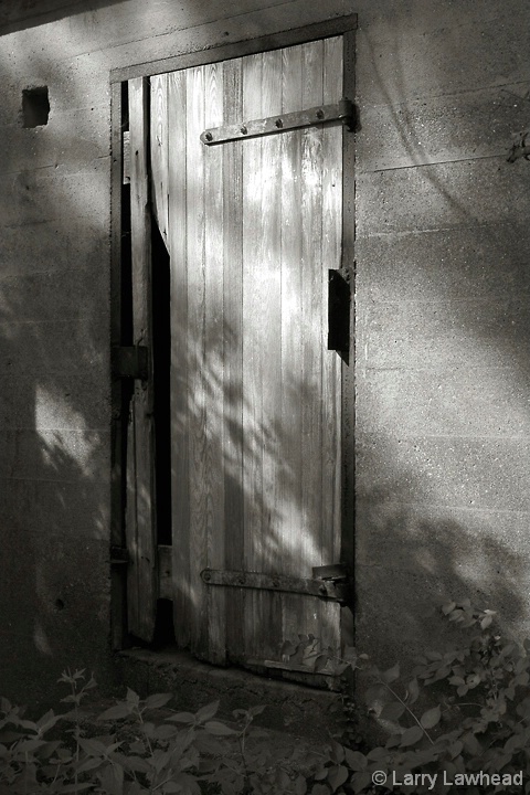 Weathered door, shadowed