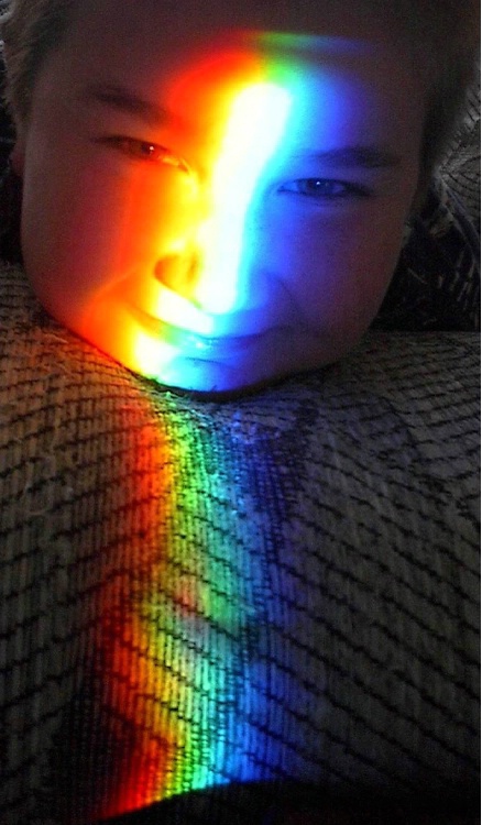 Rainbow Reflection On Son's Face