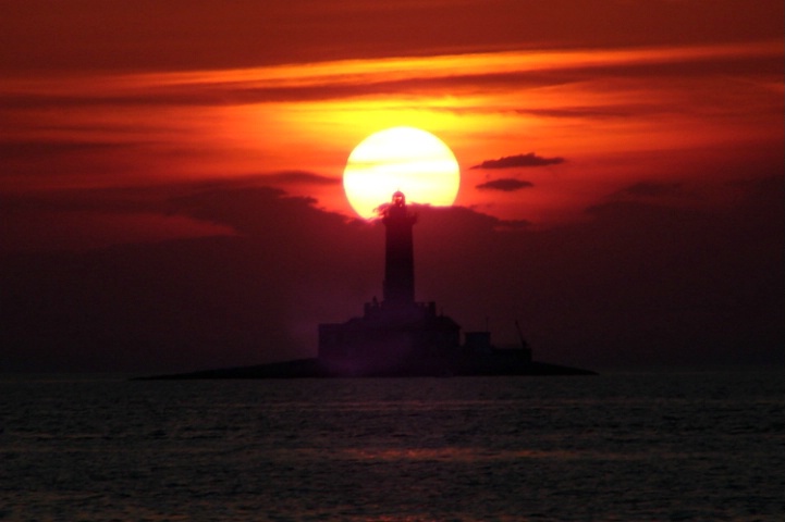 Lighthouse and Sun