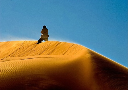 At The top of the dune