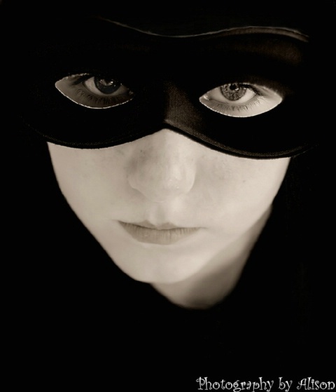 Masked In Black