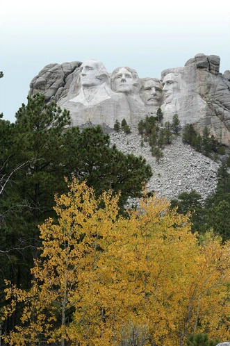 Mt. Rushmore with aspen tree