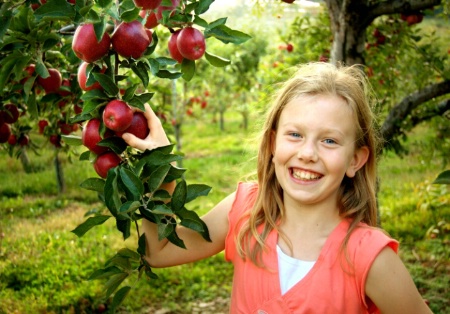 Girl in orchard