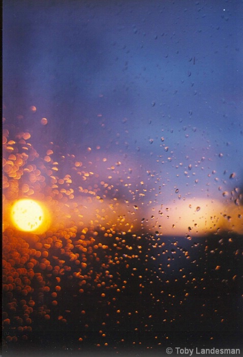 Sunrise through a rain splattered window - ID: 4853673 © Toby Landesman