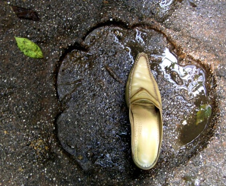 A shoe and a footstep