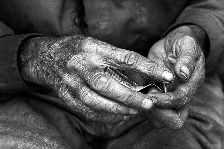 Photography Contest Grand Prize Winner - <b>Homeless Man's Weathered Hands</b>