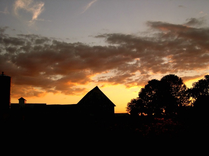 Sunsetting over old barn