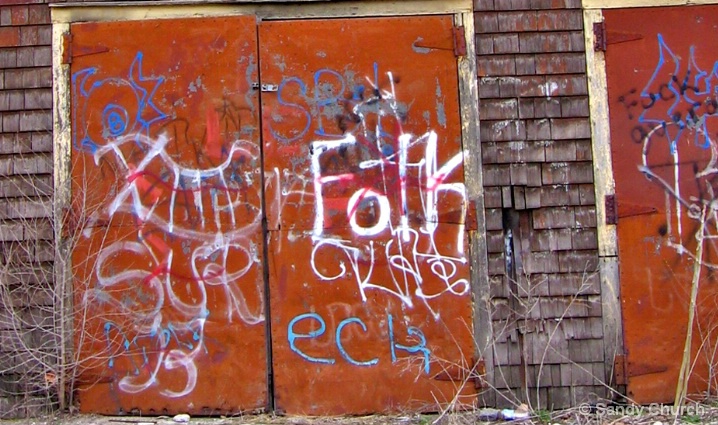Brown Doors with graffiti
