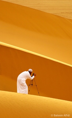 Photographer and sand