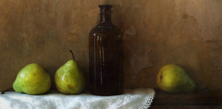 Three pears with brown bottle