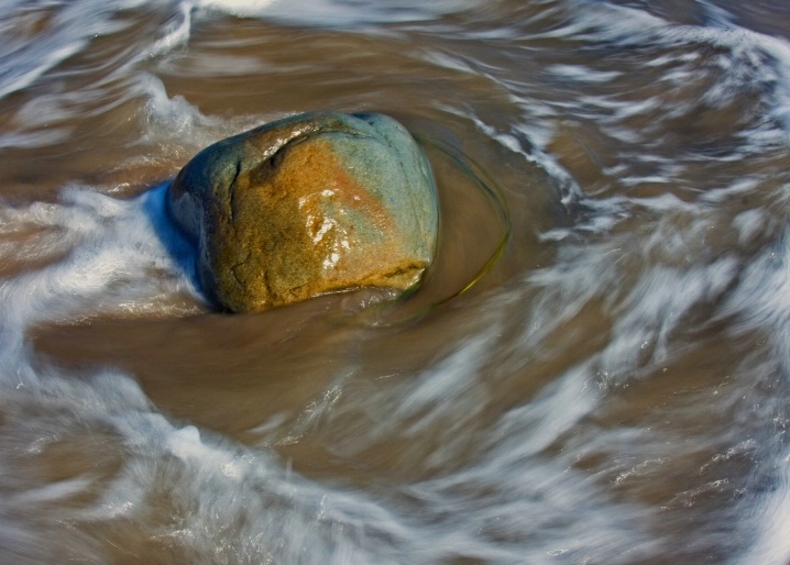 rock in the surf-horizontal image