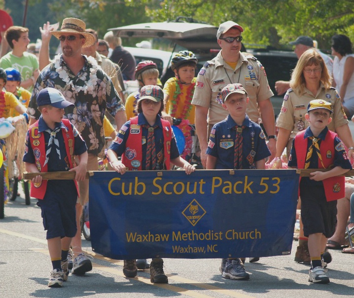 Boy scouts lead the parade...