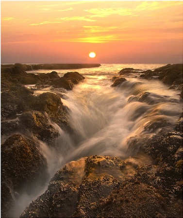 Waterfalls At Sea