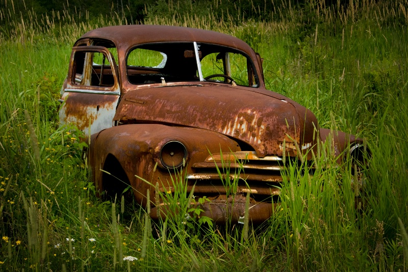 Old abandoned rusted car Ontario Canada