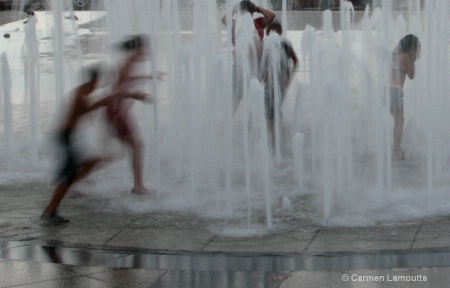 Playing in the Water Fountain- Blurred