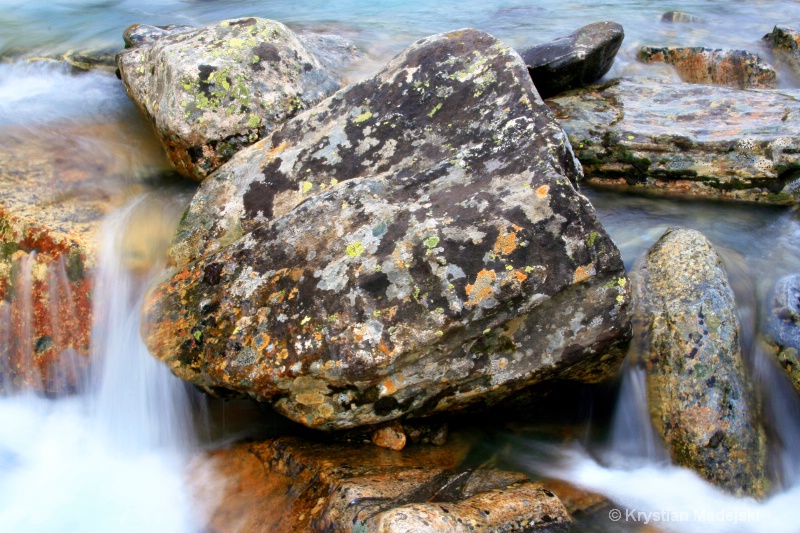 Mossy rocks in the river - rocks and water