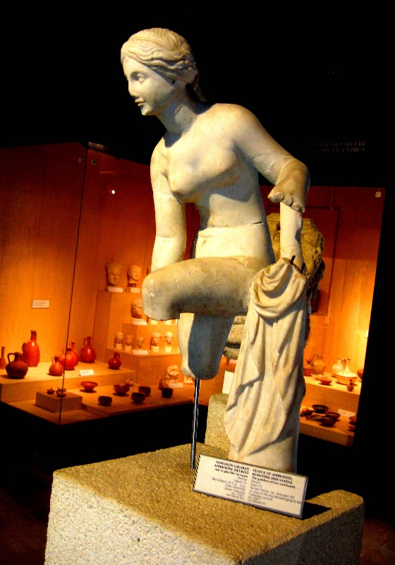 Statue of Aphrodite, removing her sandal