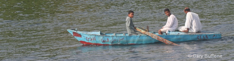 Boy Rowing Boat