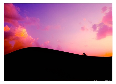 Photographer and sunset