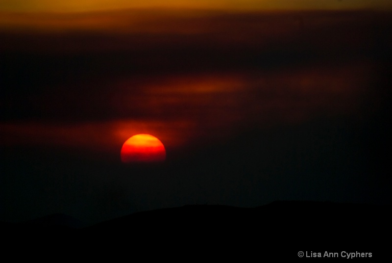 Sunset thru the fire  - ID: 7431065 © Lisa Ann Cyphers