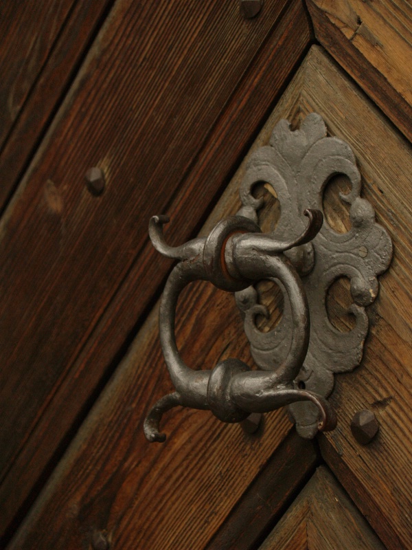 Door with antique hardware