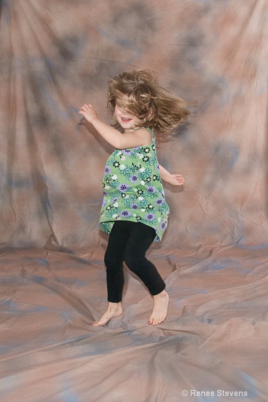 Ainsley jumping and twirling