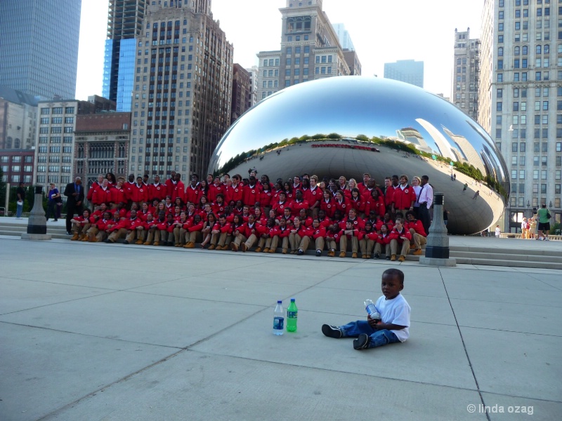 Red Jackets and One Boy at The Bean, Chicago