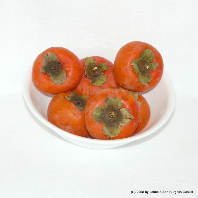 Fuyu Persimmons in White Bowl