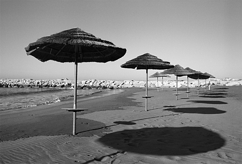 The sea, sand and parasols