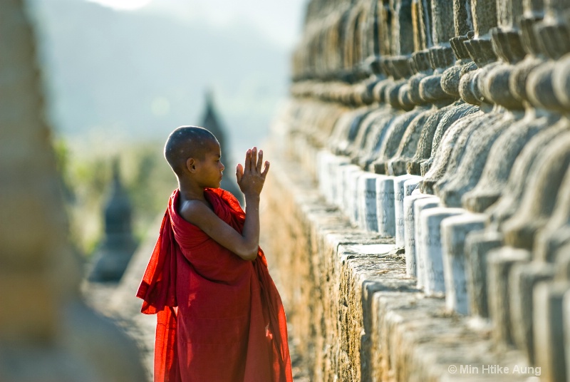 Praying To The Buddha