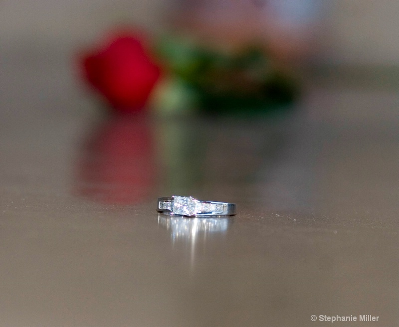 a ring and a rose for the soon to be bride